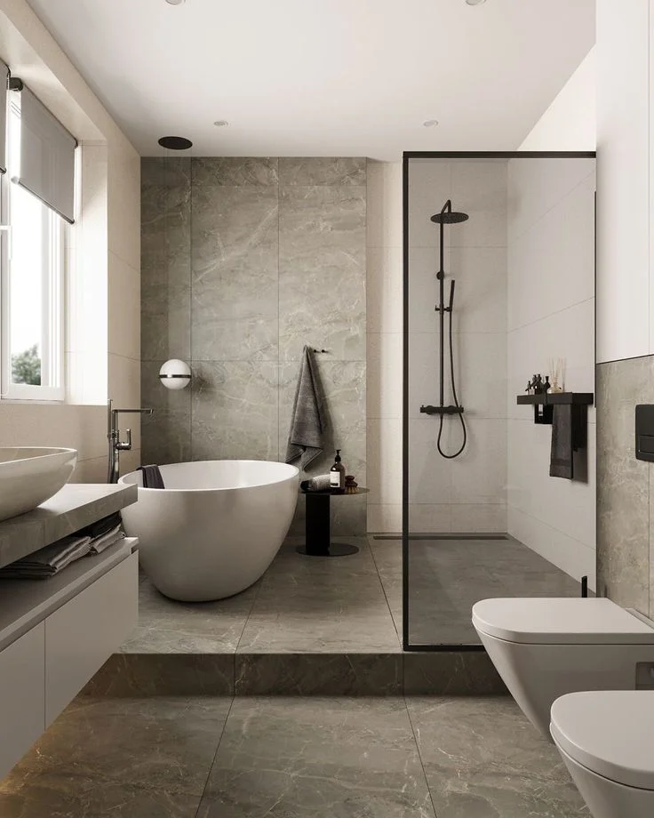 Modern bathroom with freestanding tub and marble